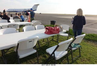 29 9sm. Riverton Airport - airplane and chairs