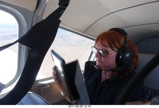 Deborah Marcus in the back seat of N8377W