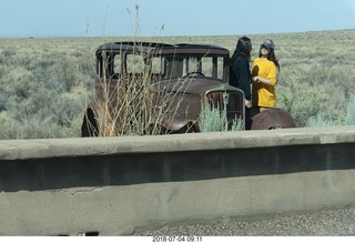 47 a03. Petrified Forest National Park - old, beat-up car on Route 66