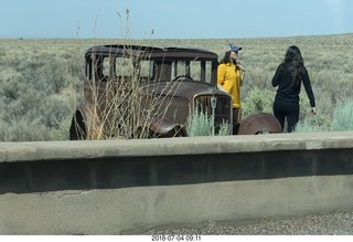 48 a03. Petrified Forest National Park - old, beat-up car on Route 66