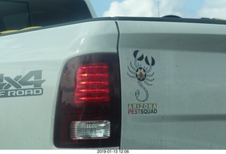 cool exterminator logo on pickup truck