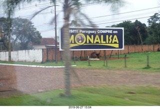 252 a0e. drive back to hotel - Monalisa sign