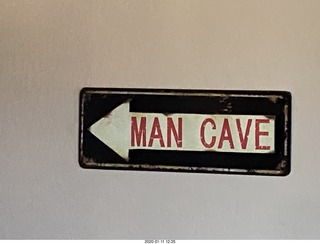 Flagstaff FLG Wiseman Aviation - MAN CAVE sign