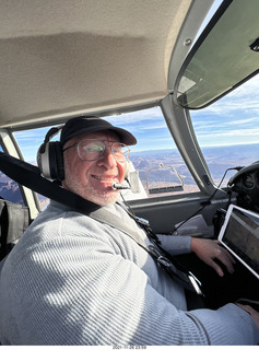 Adam flying N8377W