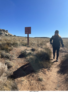 70 a19. Utah - Canyonlands National Park - Lathrop hike - Shea and sign