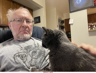 Adam with my cat Devin on my lap