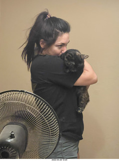 door open with cat Miss Pris in the bathroom with Olga