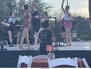 Ballet Arizona warming up at Desert Botanical Garden - person with Pilobolus shirt