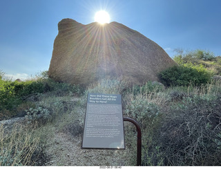 Marcus Landslide Trail sign and sun