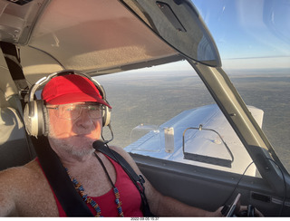 Adam flying N8377W