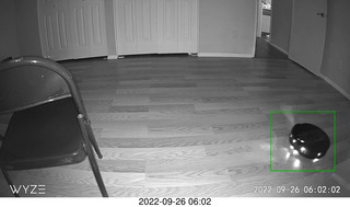 dark room with Sharknado robot vacuum
