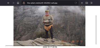 old picture of Adam atop Angels Landingn with Forman's slide rule