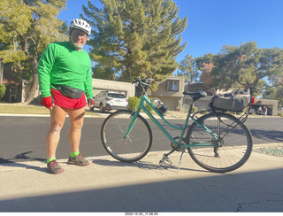 Adam dressed for biking in red-green Christmas colors