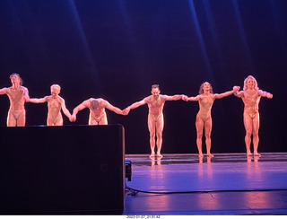 bathroom - water holder behind urinal pipes