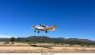 Adam flying N8377W