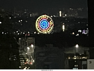 197 a24. Mexico City at night - cool ferris wheel in the distance