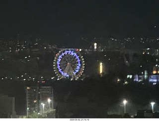 199 a24. Mexico City at night - cool ferris wheel in the distance