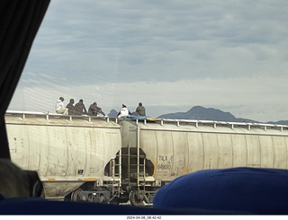 5 a24. Torreon - Mexicans riding the tops of freight-train cars