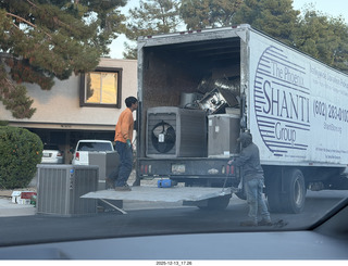 169 a2q. neighbor's house with air conditioner on the street with truck