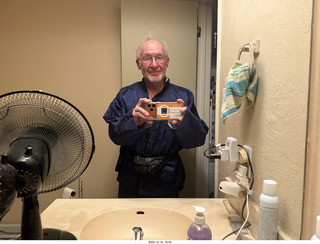 cat Pickle on my coat rack