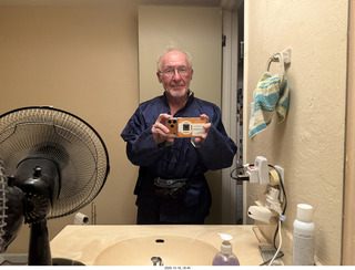 cat Pickle on my coat rack