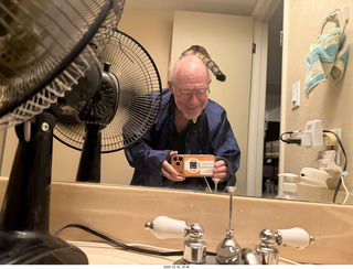 cat Pickle on my coat rack