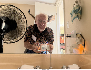 Adam with cat Pickle on my back