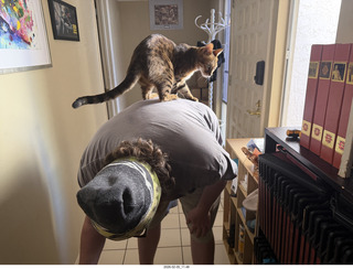 Adam with cat Pickle on my shoulder