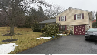 AirBnB house - gray, snowy street