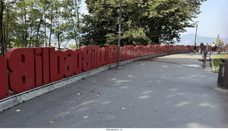 19 a2y. Spain - Bilbao - walking tour - city viewpoint - big red city-name letters