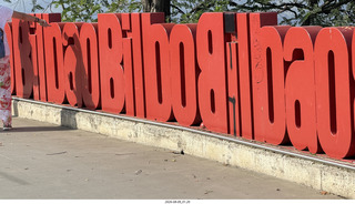 30 a2y. Spain - Bilbao - walking tour - city viewpoint - big red city-name letters