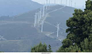 7 a2y. Spain - bus tour of north shore - beach with windmills