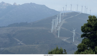 8 a2y. Spain - bus tour of north shore - beach with windmills
