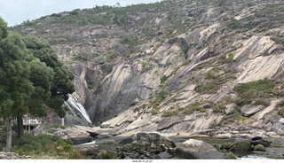 73 a2y. Spain - bus tour of north shore - river ending in waterfall