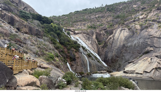 76 a2y. Spain - bus tour of north shore - river ending in waterfall