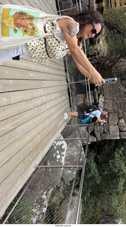 84 a2y. Spain - bus tour of north shore - river - people taking pictures of people