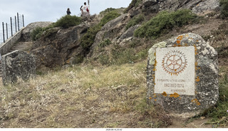 113 a2y. Spain - bus tour of north shore - Fisterra - the end of the world - Rotary Club monument