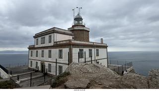 121 a2y. Spain - bus tour of north shore - Fisterra - the end of the world - lighthouse