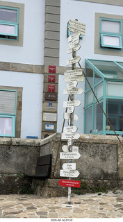 126 a2y. Spain - bus tour of north shore - Fisterra - the end of the world - world-places sign