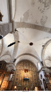 211 a2y. Spain - bus tour of north shore - church - hanging boat