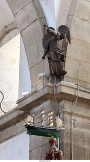 213 a2y. Spain - bus tour of north shore - church - hanging boat